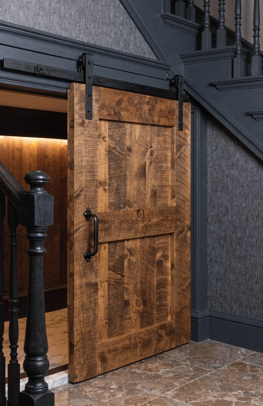 sliding barn door detail on under stairs dog kennel