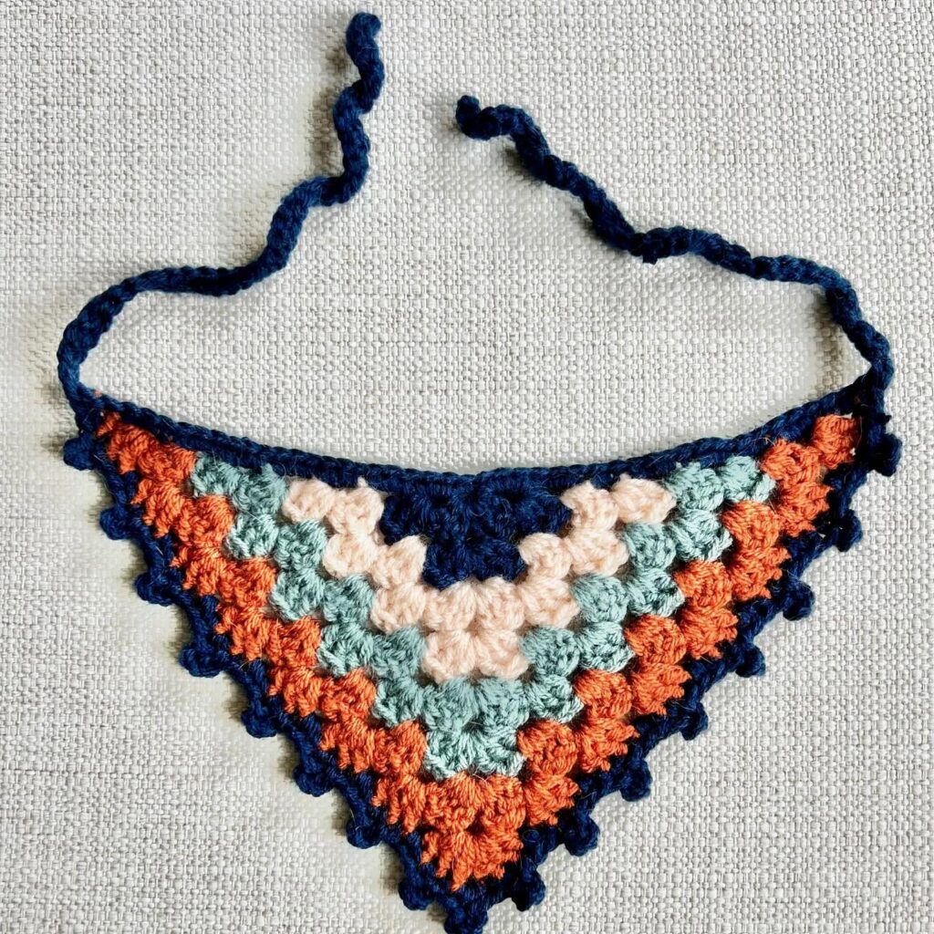 Crochet granny stripe colorblock dog bandana in navy orange and sage