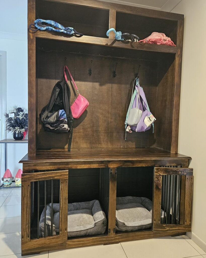 dark walnut hall tree with dual slatted dog crate bays built into base for two dogs