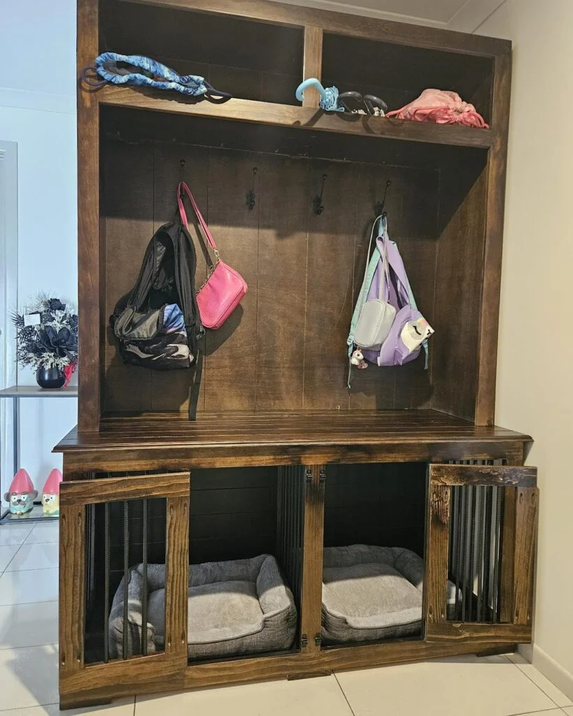 dark walnut hall tree with dual slatted dog crate bays built into base for two dogs
