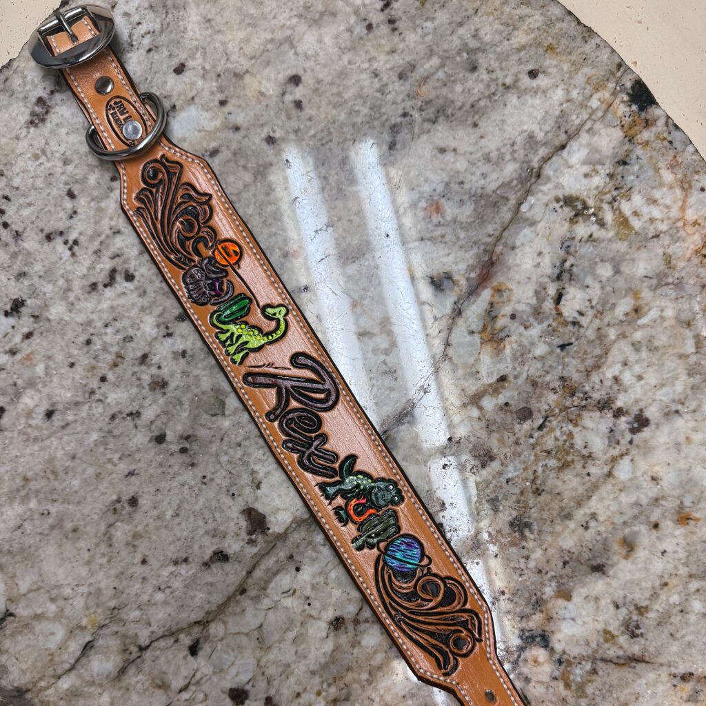 Hand painted custom art leather dog collar with colorful dinosaurs and fantasy motifs on tan leather