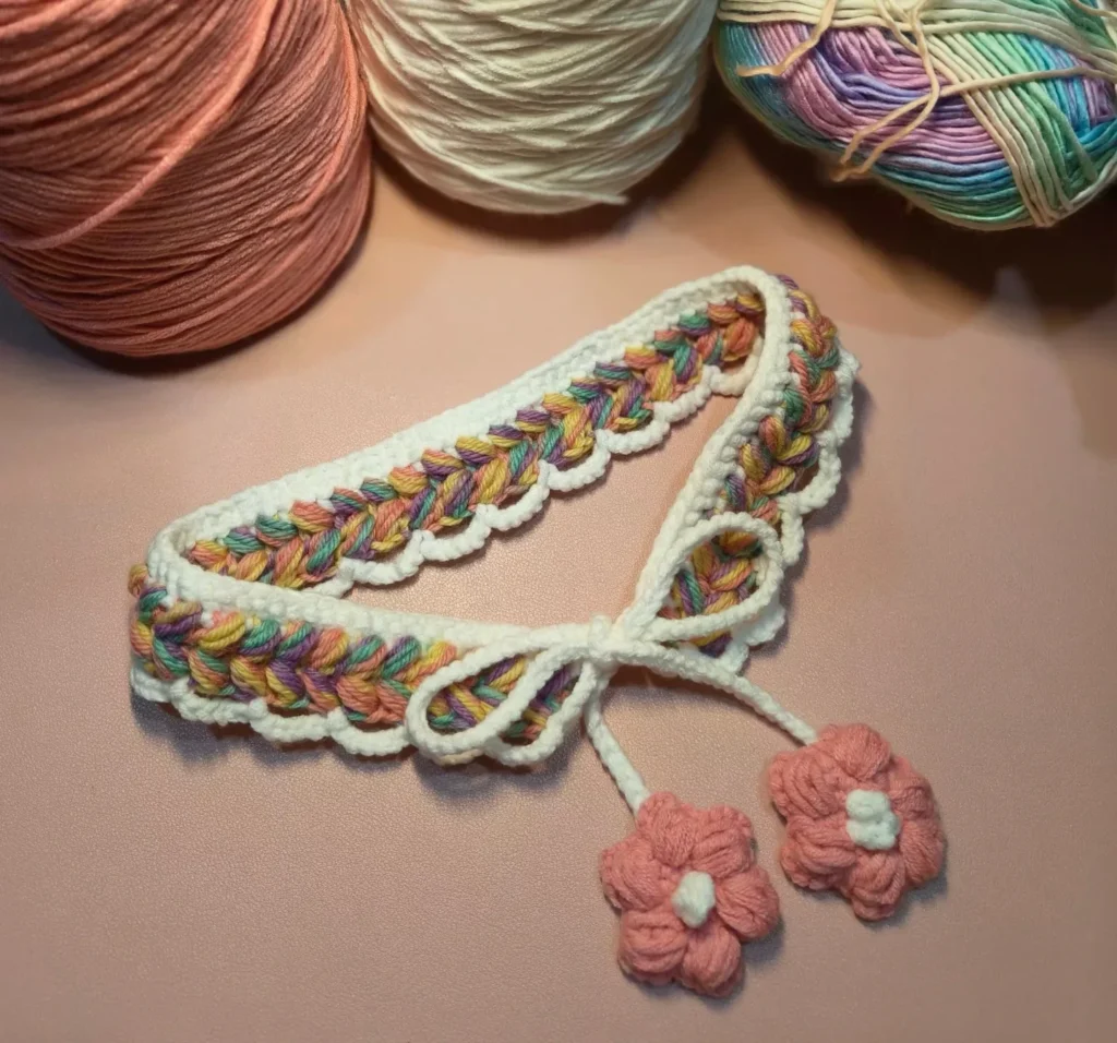 herringbone braided rainbow bandana with pink flower charm ties