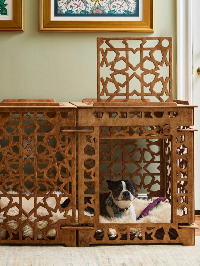 ornate Moroccan fretwork laser cut designer dog crate as decorative living room furniture feature