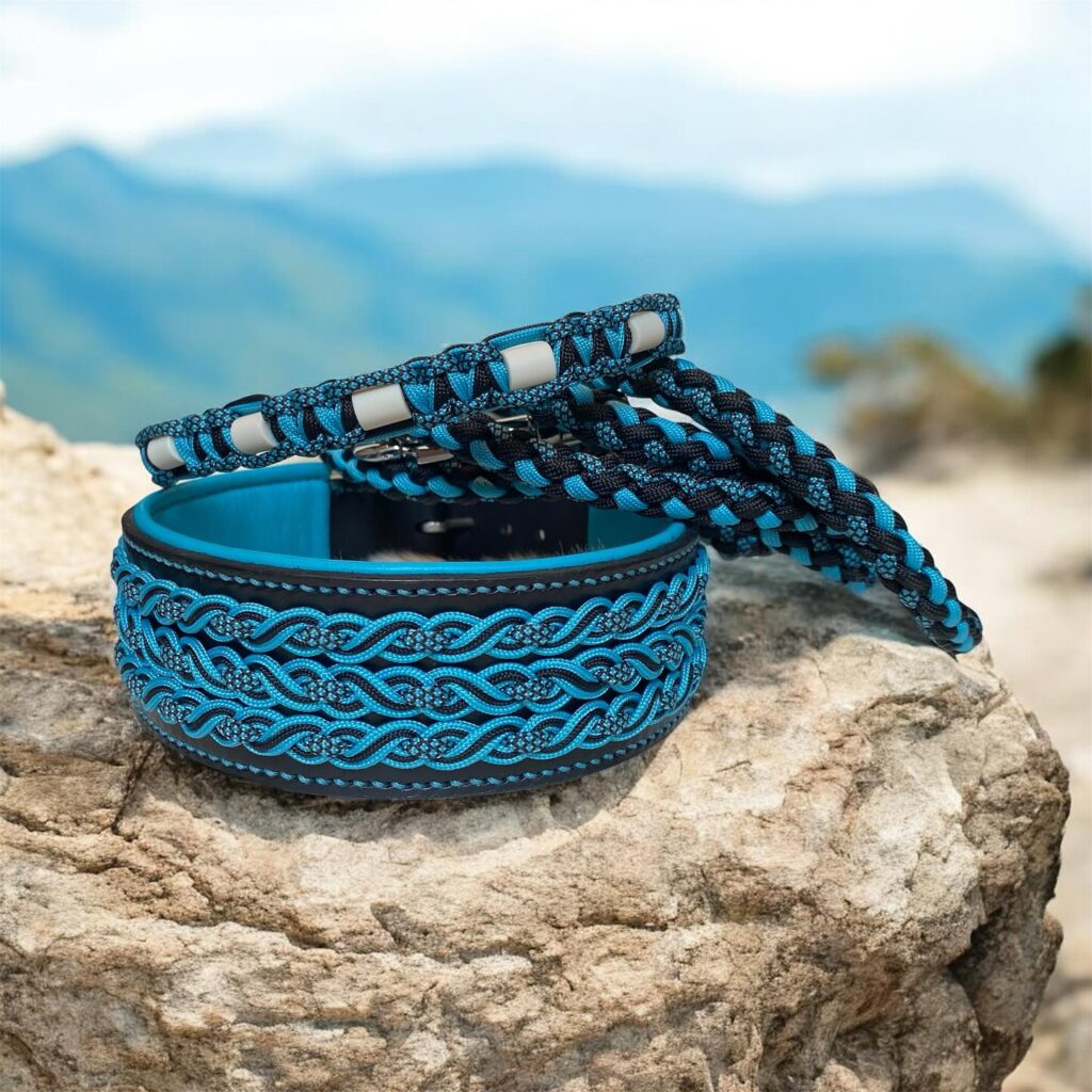 Paracord braided leather dog collar and leash set in navy and teal with reflective thread on mountain rock