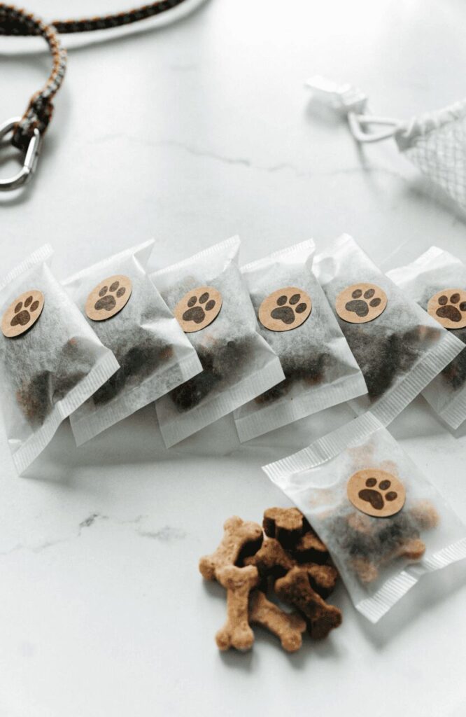 small wax paper treat pouches pre-portioned with homemade dog training treats