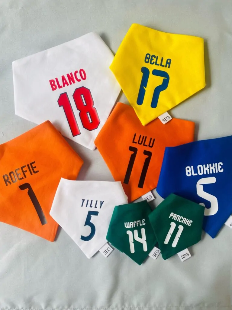 Colorful personalized sports jersey style dog bandanas with names and numbers