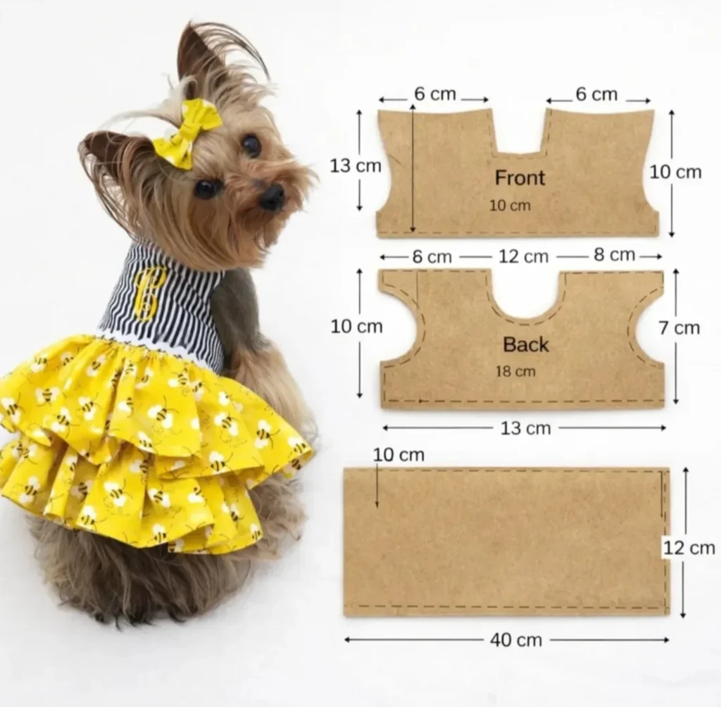 yorkshire terrier in yellow bee print tiered ruffle dog dress beside diy dog cloth pattern pieces