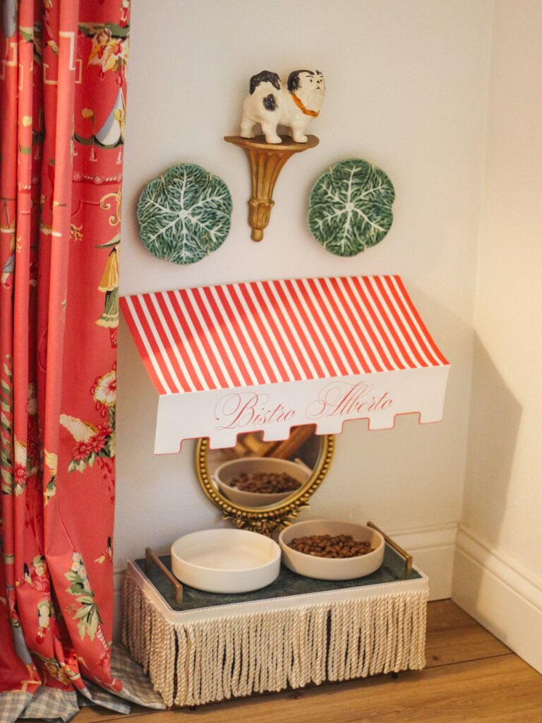 Whimsical striped awning novelty dog bowl stand display