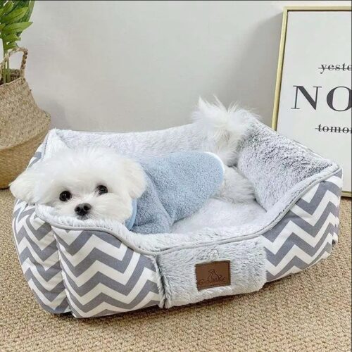 Rectangular dog bed with sewn in fleece hood flap