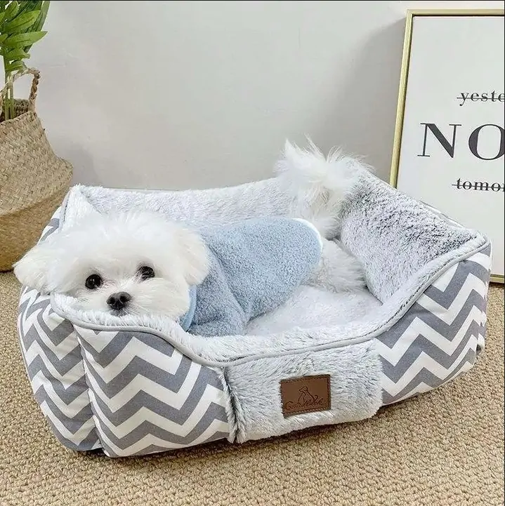 Rectangular dog bed with sewn in fleece hood flap