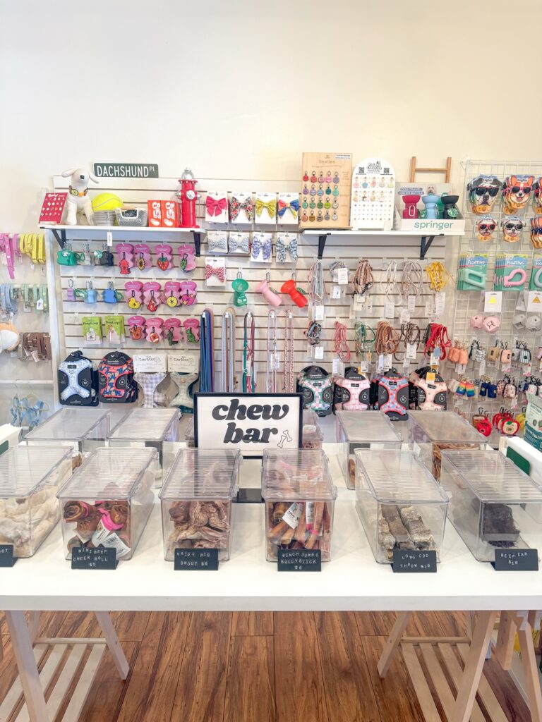 Street-sign style aisle label in a dog boutique display