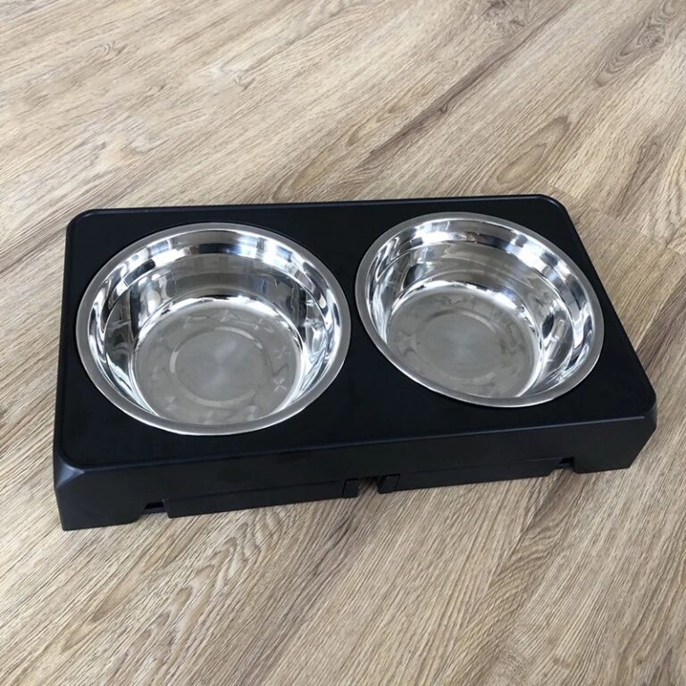 Top view of folded black adjustable dog bowl stand