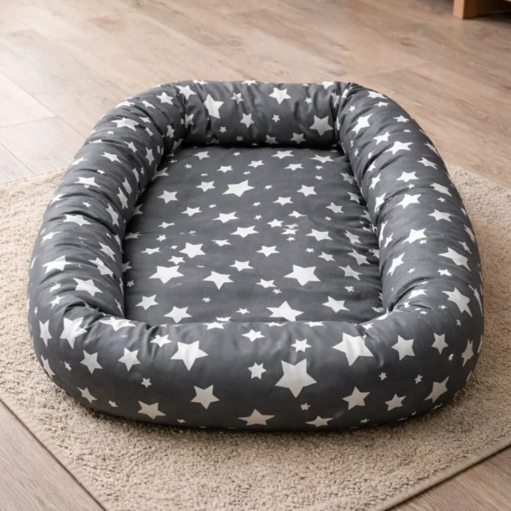 Round dog bed sewing pattern with gray star print fabric