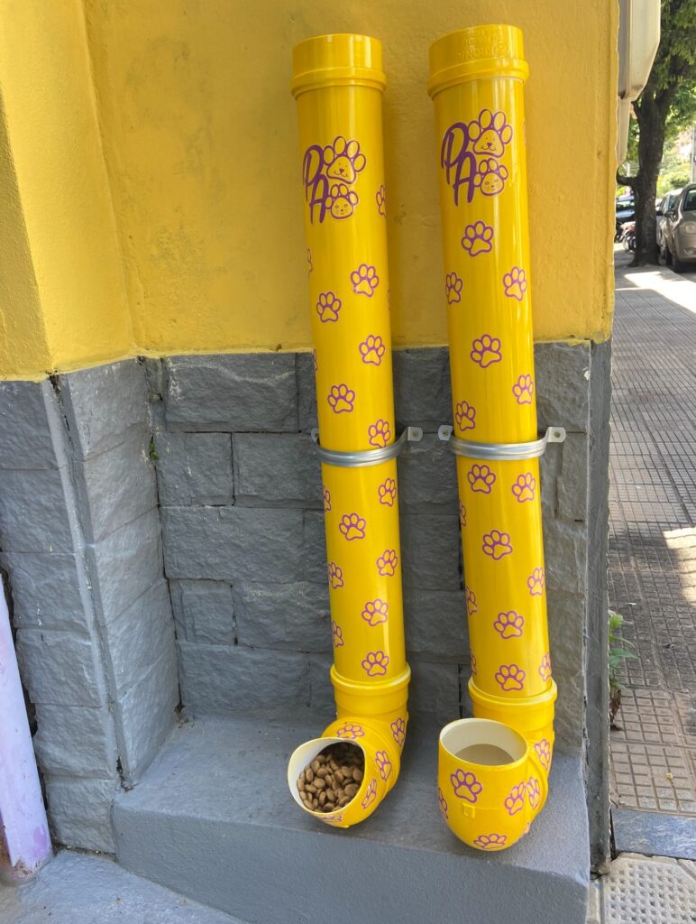 DIY dog feeder idea using yellow PVC pipe station