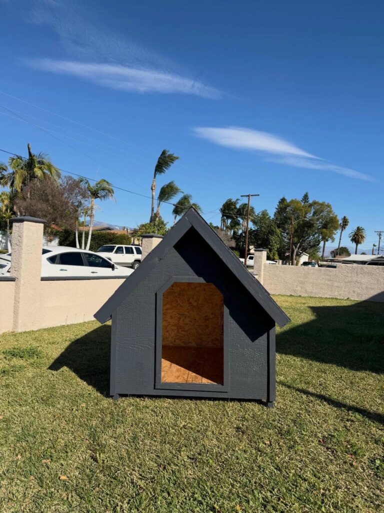 Minimalist charcoal gray wooden dog house A-frame