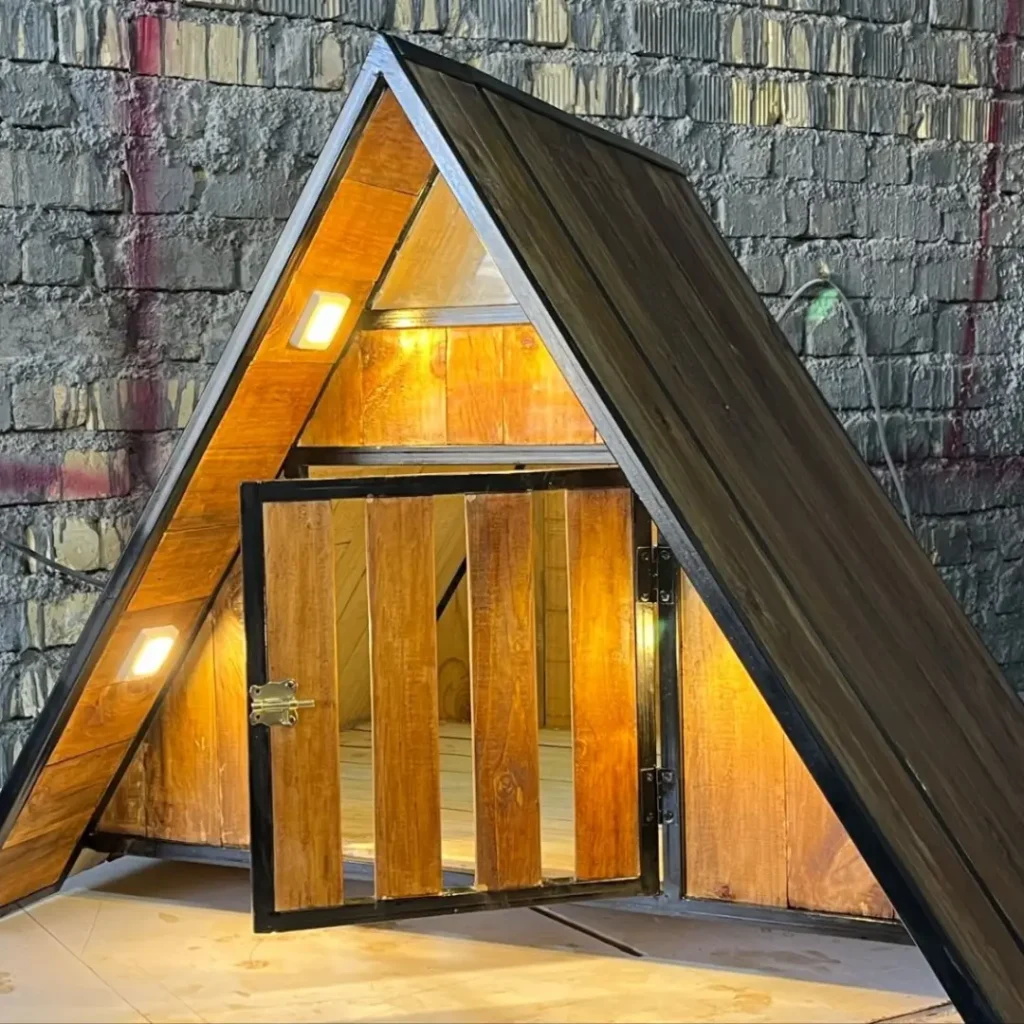 Rustic wooden dog house idea with built in interior lighting