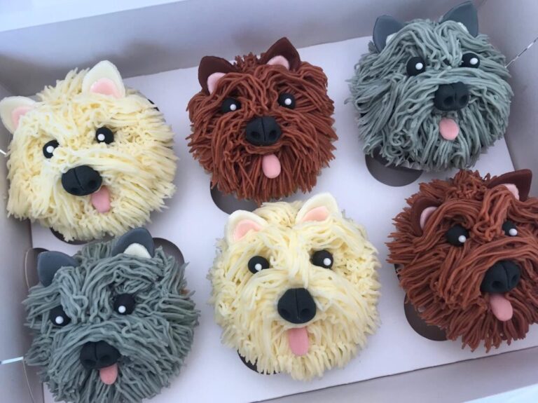 Dog birthday cupcakes recipes styled as shaggy dog face with fondant details