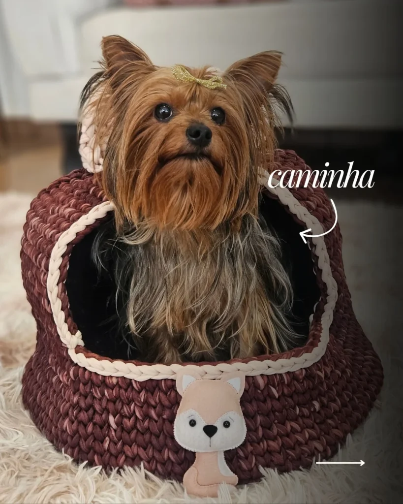 Cozy crochet nest bed with braided trim and fox appliqué