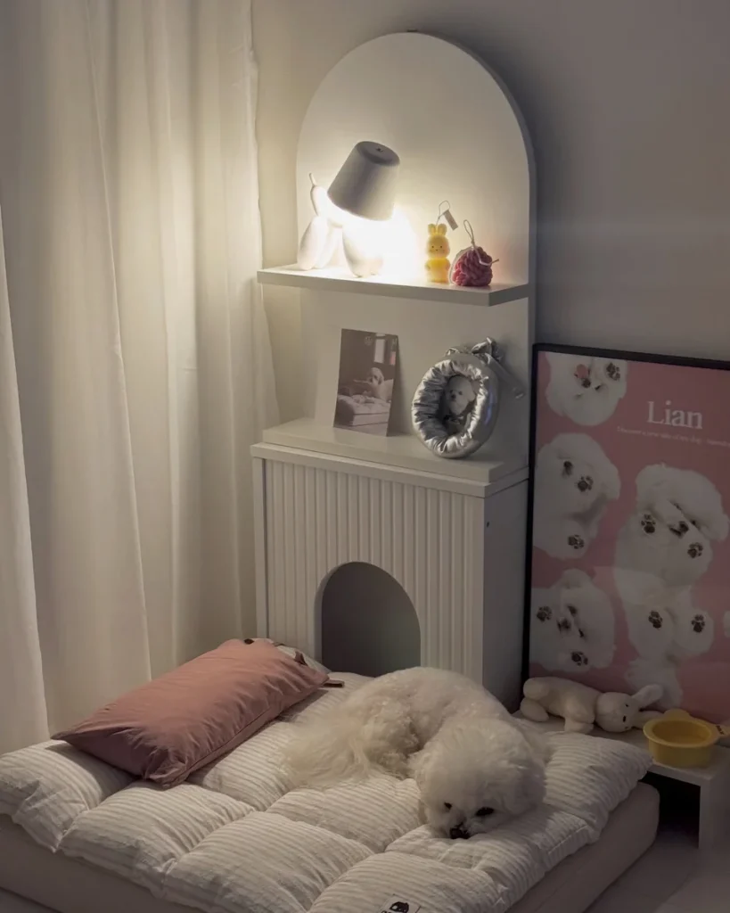 Same arched dog bed nook and styled shelf lit up at night