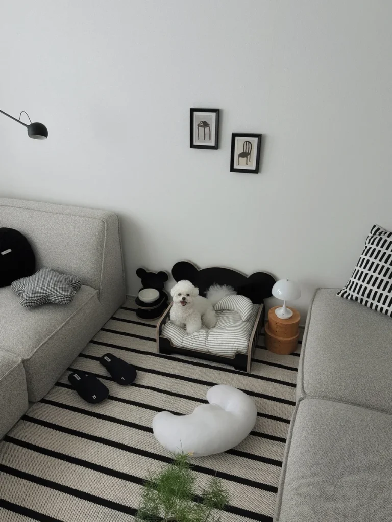 Black bear shaped dog bed frame in a monochrome Dog Room Decor Ideas setup