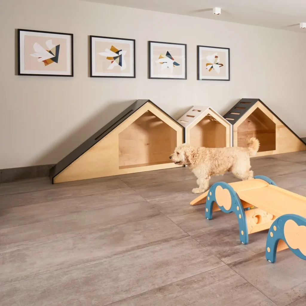 Built in wooden dog den wall with framed art above