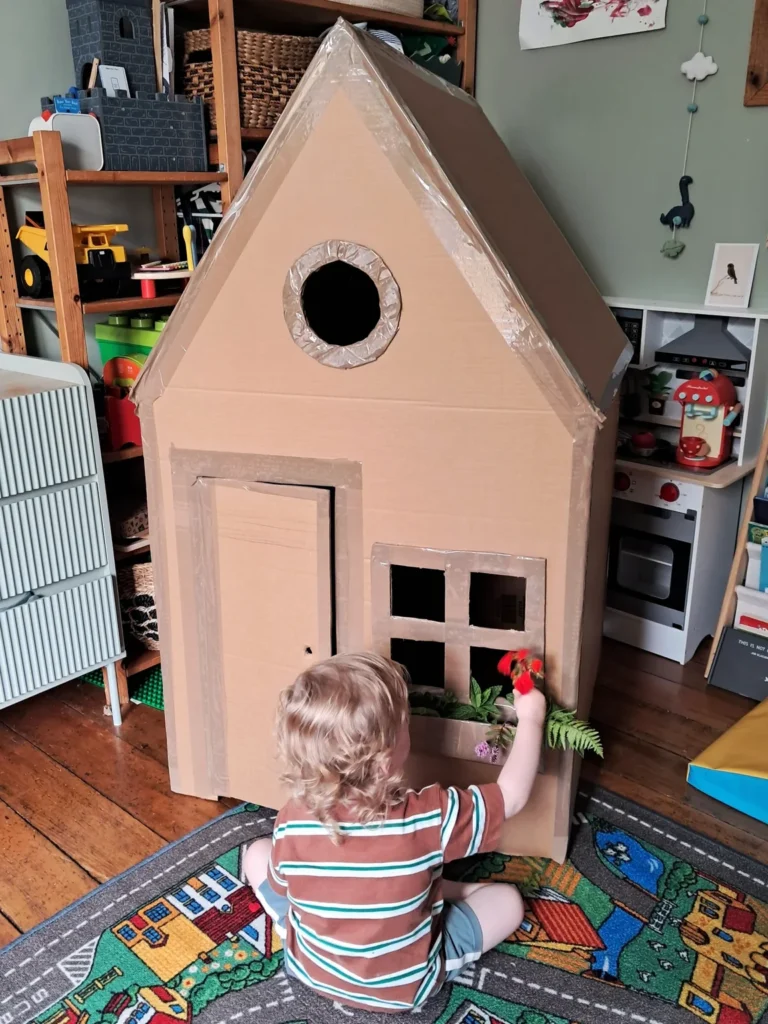 Cardboard playhouse style inspiration for paper dog house tutorials