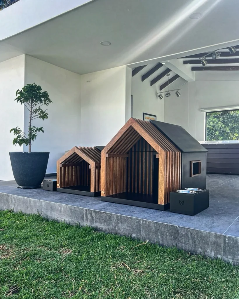 Modern slatted wood double dog house design for outdoor use