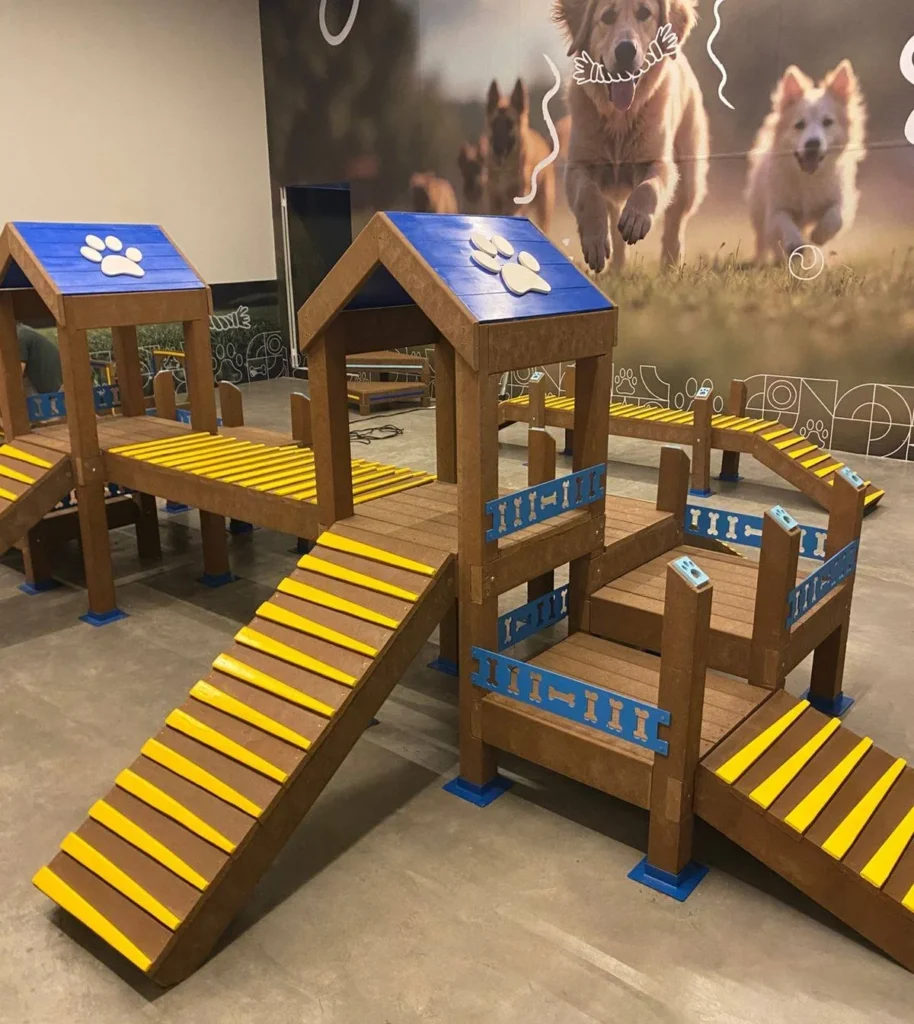 Multi tier wooden playhouse structure for dogs with ramps