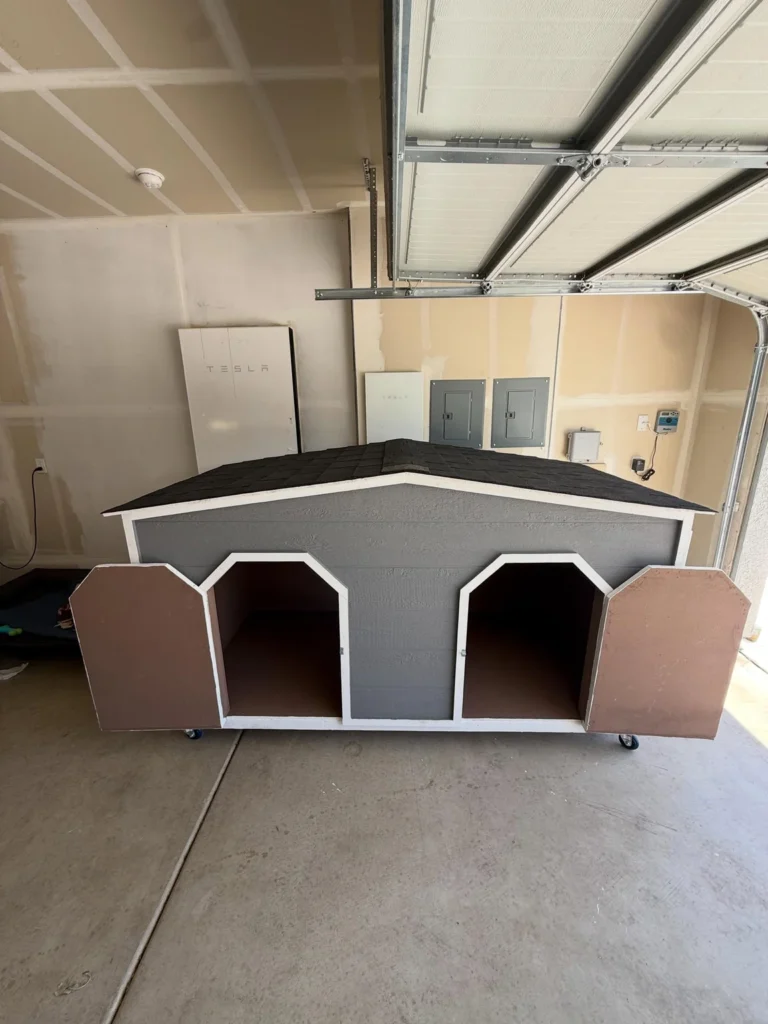 Portable double dog house idea with wheels, front view