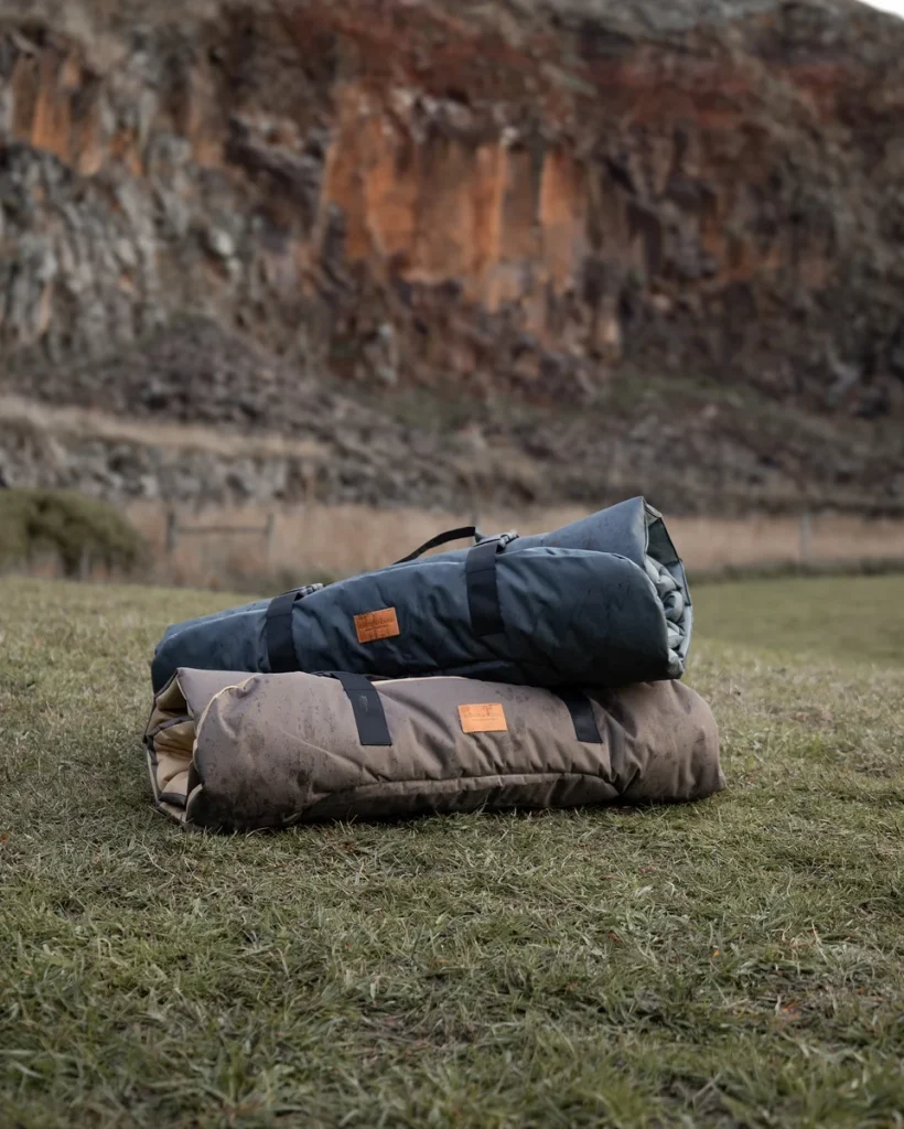 Rolled up structured field mats, one of many portable outdoor dog bed ideas