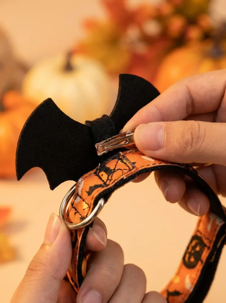 Clip-on method for attaching a bat bow tie to a dog collar
